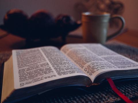 A Bible and a coffee together
